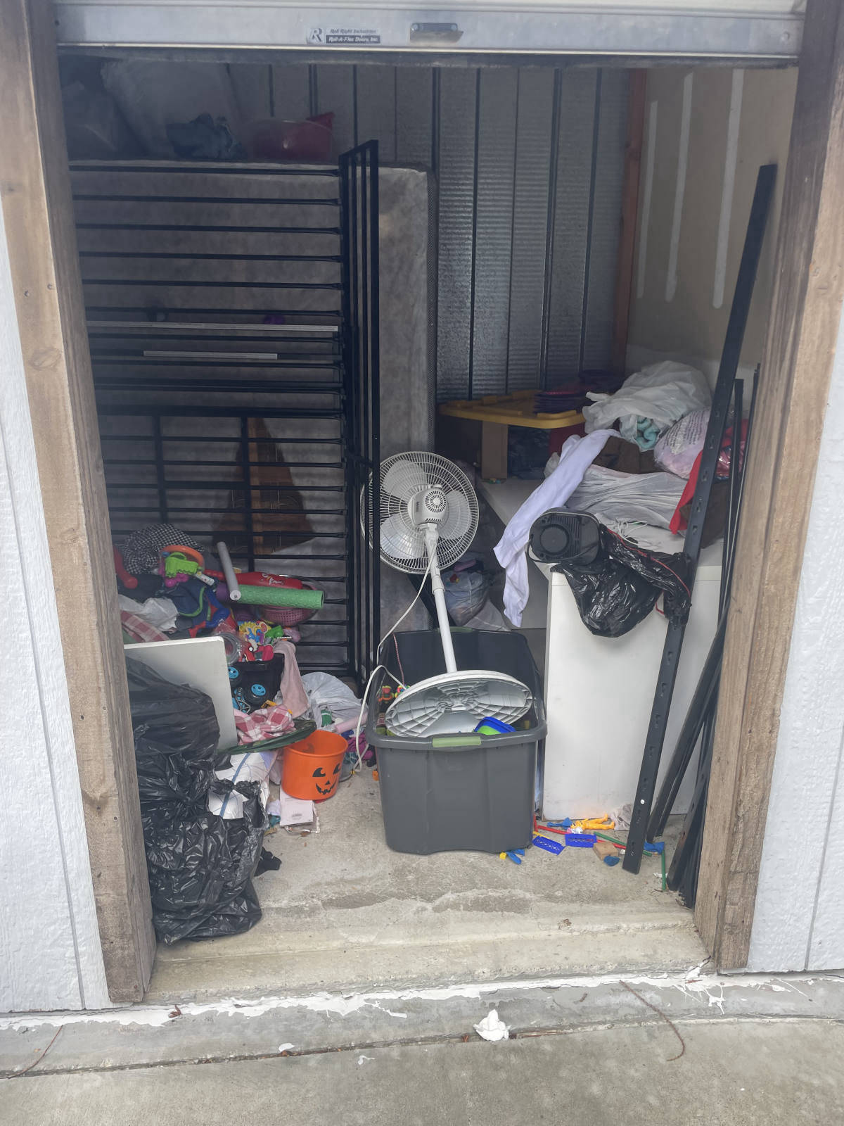 Storage unit full of junk before cleanout
